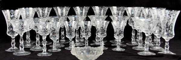 29 PIECE ETCHED GLASS LOT: Twenty-nine Piece Etched Glass Lot with same pattern. 7 deep, 8 inches; 7 shallow, 8 inches; 8 rummers, 6 inches; 5 cordials, 5.5 inches; 1 sorbet, 5.5 inches; 1 candy dish, 7 inches. No makers mark.