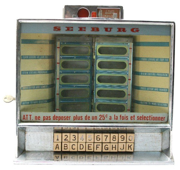SEEBURG TABLETOP JUKEBOX WITH FRENCH INSTRUCTIONS: Seeburg 50 track tabletop jukebox with French Canadian instructions "ATT. ne pas deposer plus de un 25c a la fois et selectionner." Not Tested, includes key. Some wearing and oxidation of chrome and s