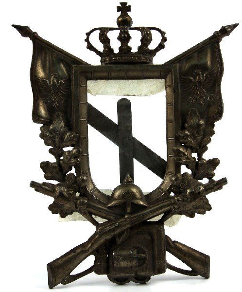 WWI IMPERIAL GERMAN MEMORIAL PICTURE FRAME: WWI Imperial German photo frame. Military motif of crossed rifles, helmet, coat of arms flags, and crown at top. Complete with glass. Marked DRGM 62251 on back. Very good condition.