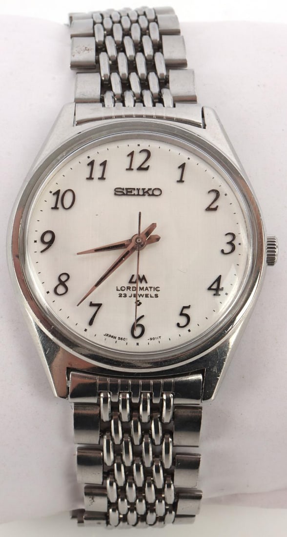 VINTAGE MENS SEIKO LM LORD MATIC AUTOMATIC WATCH: Automatic movement. Great condition, runs well. With original stainless steel band. 23 jewels, case measures 37 mm including crown. Crystal has a few surface scratches that can only be viewed upon ver