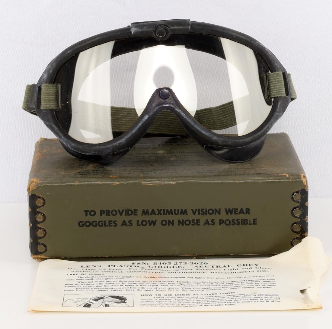 AMERICAN OPTICAL US MILITARY GOOGLES 8455-161-4068: American Optical Military Goggles with extra lenses M-1944 P/N 8465-161-4068 in the original box and packaging. No scratches in either clear or tinted lenses. Dimension: 8.5 X 4.5 X 2.5 inches.