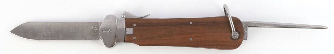 WWII GERMAN LUFTWAFFE PARATROOPER GRAVITY KNIFE: WWII German Reich Luftwaffe Paratrooper's Gravity knife. Steel blade with wooden grip. Gravity action gets blade halfway released. Base of spike is marked "R.B. NR. 0/0561/0019." Blade approx. 4 inche