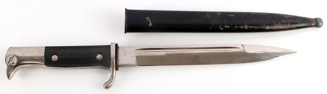 WWII GERMAN THIRD REICH K98 DRESS BAYONET: Nickel plated steel bayonet with Bakelite grips and housed in anodized scabbard. EPS maker's mark. Measures 13 5/8 inches. Very good condition.