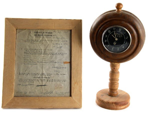 WWII GERMAN STAFF CAR CLOCK & GAUGE W CERTIFICATE: Accompanied with a retention certificate 26 November 1945, Nazi Staff car clock and fuel gauge. In wood mount, clock is marked Kraftstoff and DKW.