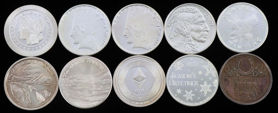 LOT 10 1OZ .999 FINE SILVER ROUNDS ASSORTED THEMES: Total of 10 electronically tested .999 fine silver bullion rounds. Includes NFL, Sunshine Minting eagle, Christmas, Indian Head / Buffalo, Cincinnati Bicentennial, and more. Heavy toning to NFL round.