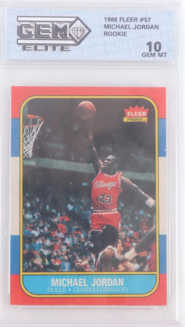 1986 FLEER #57 MICHAEL JORDAN ROOKIE CARD: 1986 Fleer #57 Michael Jordan rookie card graded by Gem Elite. Graded a 10 Mint. The lower left corner would suggest against the grading. Very good condition.