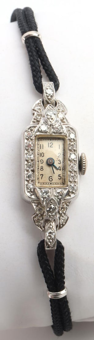 ART DECO GIRRAUD PERREAUX PLATINUM DIAMOND WATCH: Perreaux platinum iridium and diamond ladies watch, Swiss made , 17 jewel, starts and holds. Condition: overall good with loss to edges of crystal and enamel to face. Length 6 1/2 inches. Case width 1