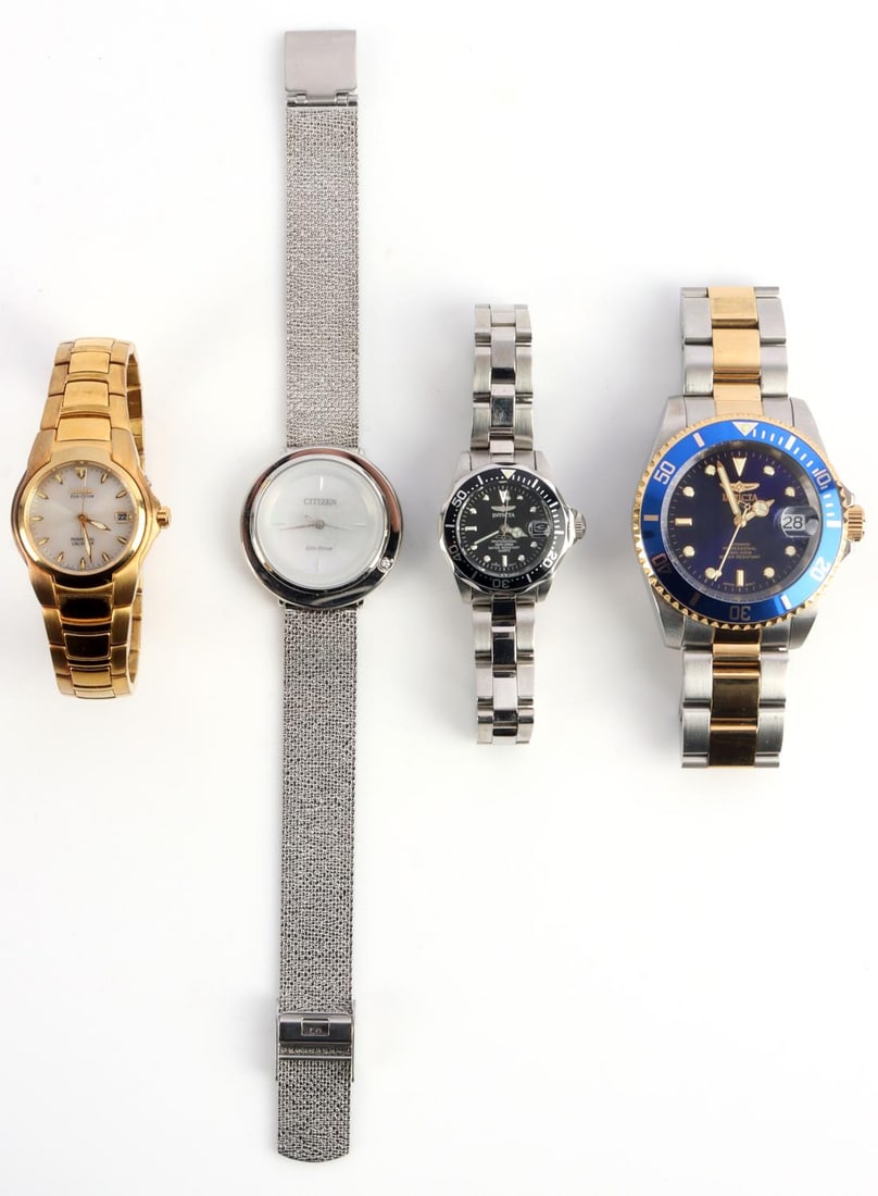 INVICTA AND CITIZEN ECO DRIVE WRIST WATCH LOT: Pre-owned wrist watches in wear or resale condition, may need batteries. Lot of 4 includes Invicta Automatic 8928OB, Invicta 8939A, Citizen Eco Drive B110 and the Citizen Eco Drive Ambulina