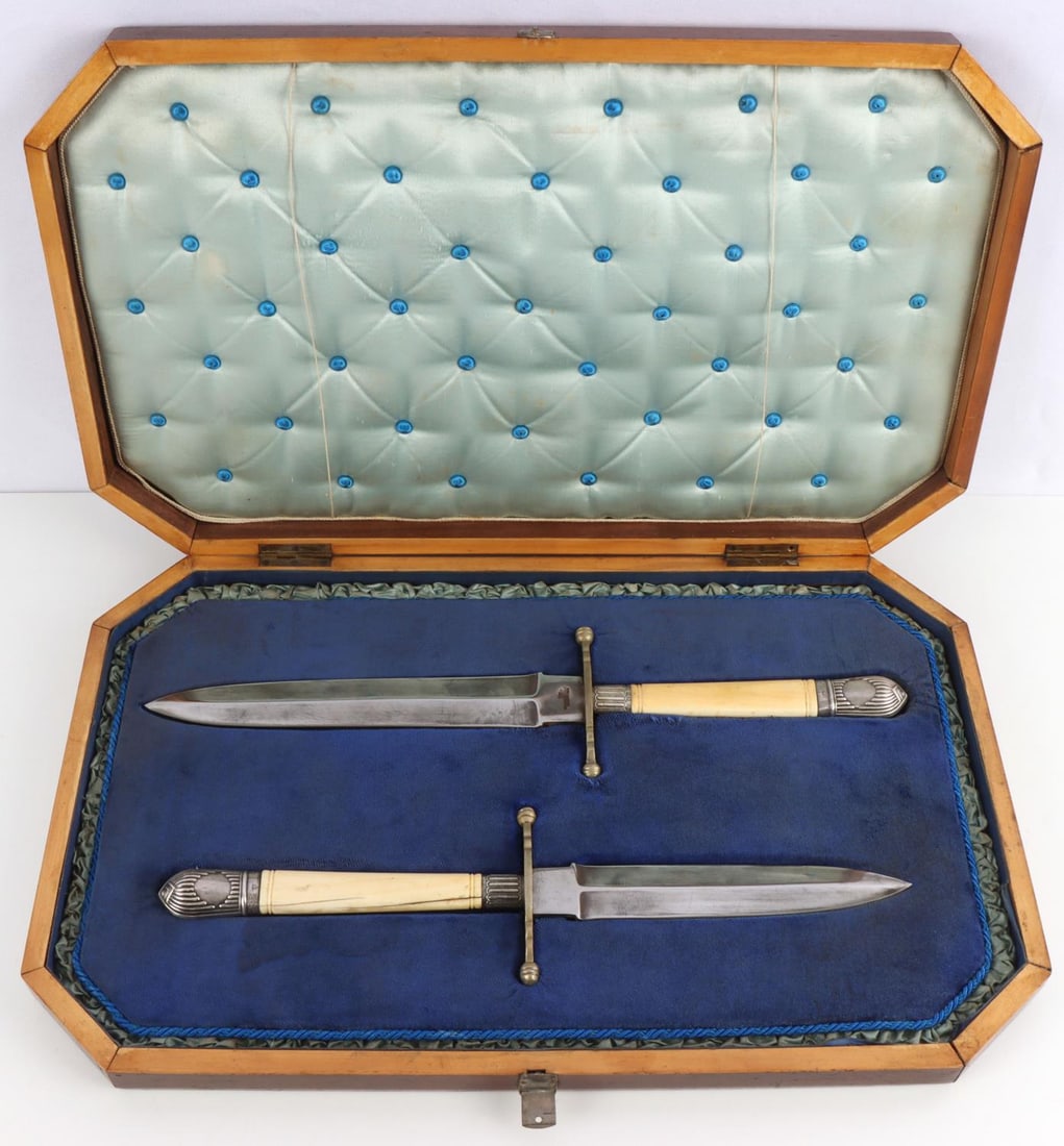 WALKER & HALL PRESENTATION DAGGER KNIFE SET: Steel blades with ivory/tusk grips. Marked Walker & Hall Sheffield. grips are tusk/ivory. Grip is silver wrapped and marked Harrison Brothers & Howson. Fitted wood case with velvet interior. Measure 1