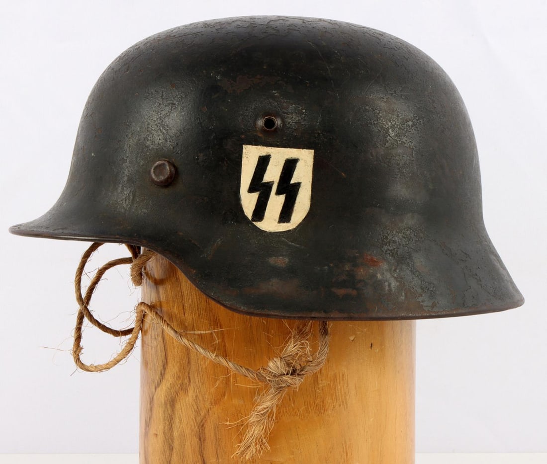 WWII GERMAN THIRD REICH DD SS HELMET: Black helmet with painted decals on left and right side. Interior marked 3440 and S E 66. Good condition overall.