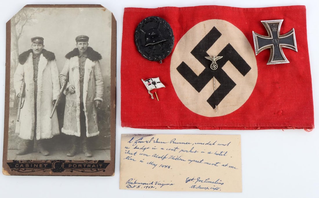 WWII GERMAN ARMBAND GI BRING BACK ITEMS: Lot appears to be a veteran owned armband that was found in an apartment by a G.I. in May 1945. This armband has a printed swastika, 1914 Iron Cross first class, a WWI Wound badge, and 2 party pins. V