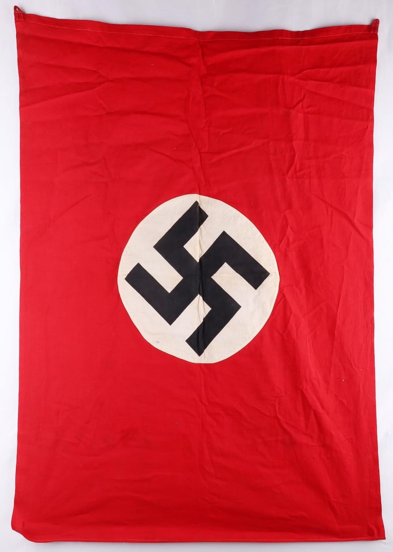 WWII GERMAN REICH NSDAP PARTY NATIONAL FLAG: A WWII German Reich NSDAP National Party Flag. Double sided construction with swastika stitched on either side of flag. Flag does no fluoresce. Flag sizes approx. 30 1/2 inches by 42 1/2 inches. Good 