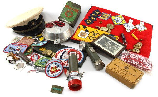 COLLECTION OF BOY GIRL SCOUT PATCHES KNIFES MORE: Large collection of Boy Scout and Girl Scout memorabilia including two BSA flash lights, mess kit, BSA US sea scout officers cap, Western 1932 sheath knife (no sheath), Girl and Boy scout first aid ki