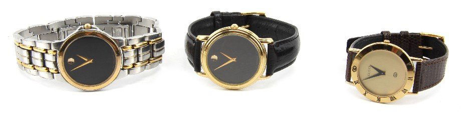 LOT OF THREE MEN'S DESIGNER WATCHES MOVADO GUCCI: Lot of Designer Men's watches to include: a Gucci 3000 M (0217765) with gold tone dial and snakeskin band, a Movado 87 E4 9890 black dial and black leather band, and a Movado 81 E4 9885 two toned with