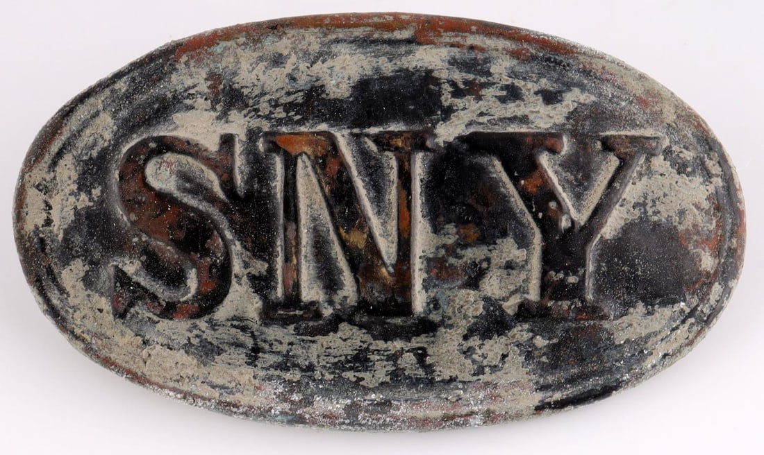 US CIVIL WAR UNION SNY CARTRIDGE BELT PLATE: United States Civil War Union State of New York militia oval cartridge belt plate. Brass non-magnetic oval plate featuring "SNY" to the front with arrow hook to reverse. Very good excavated condition 