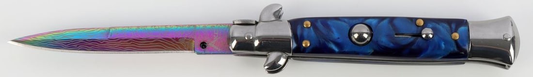 AKC ITALIAN SWITCHBLADE KNIFE NEW 8 3/4 INCH OPEN: New in wrapper and with sheath, measures 4 3/4 inches closed.