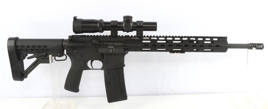 ANDERSON MANUFACTURING AM-15 5.56 CALIBER RIFLE: An Anderson Manufacturing, AM-15, Multi Cal 5.56, semi-automatic rifle. Rifle includes adjustable stock, sling attachments, one magazine, and lastly a AIM(1-4x24)XPF series scope. Rifle also includes