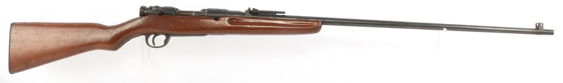 WWII SPORTERIZED JAPANESE ARISAKA TYPE 38 RIFLE: Bright and clear bore. 31 inch barrel. Receiver marked to top with Type 38 and the Chrysanthemum grounded out. Left receiver serial numbered with Manchuria arsenal mark. Non-matching serial numbers. S