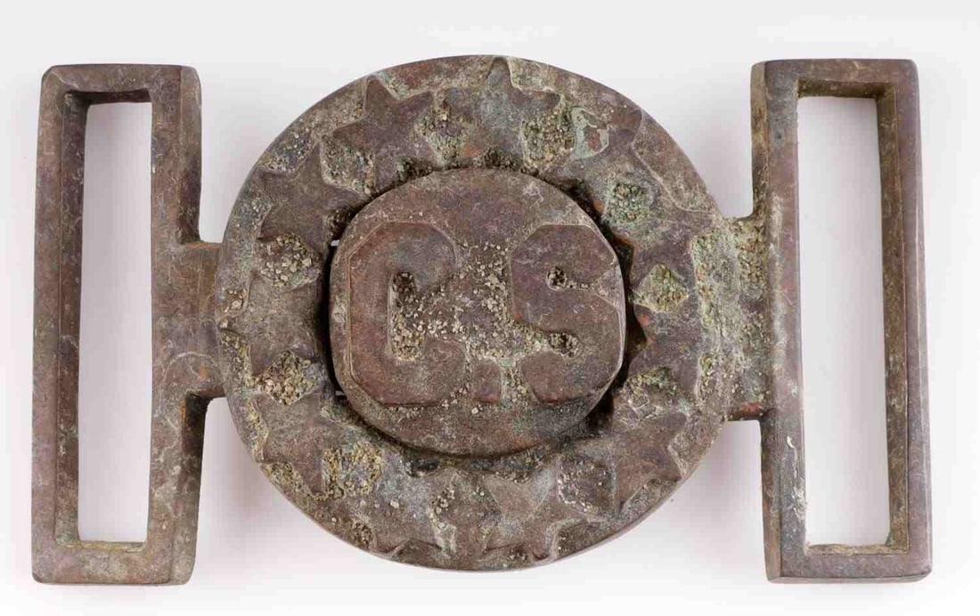 US CIVIL WAR CS CONFEDERATE BELT BUCKLE: Two-piece confederate C.S. belt buckle in bronze. Very dark patina with oxidation. Measures 2 7/8 inches. Very good condition. Collection acquired from a family who searches battlefields for belt buck
