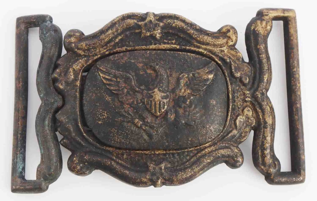 TWO PIECE PRE CIVIL WAR US MILITIA BELT BUCKLE: Federal eagle on tongue with scroll design frame. Gilt brass is heavily worn. Non-magnetic. Measures 3 3/8 X 1 7/8 inches. Very good condition. Collection acquired from a family who searches battlefie