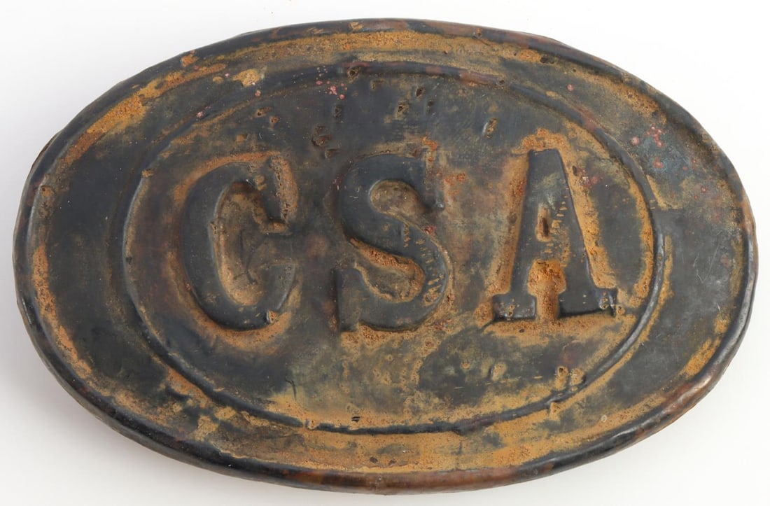 US CIVIL WAR CSA OVAL CARTRIDGE BELT PLATE: United States Civil War Confederate States of America cartridge belt plate. Brass non-magnetic oval plate featuring CSA to the front with puppy paw hooks. Very good excavated condition and measures3x2