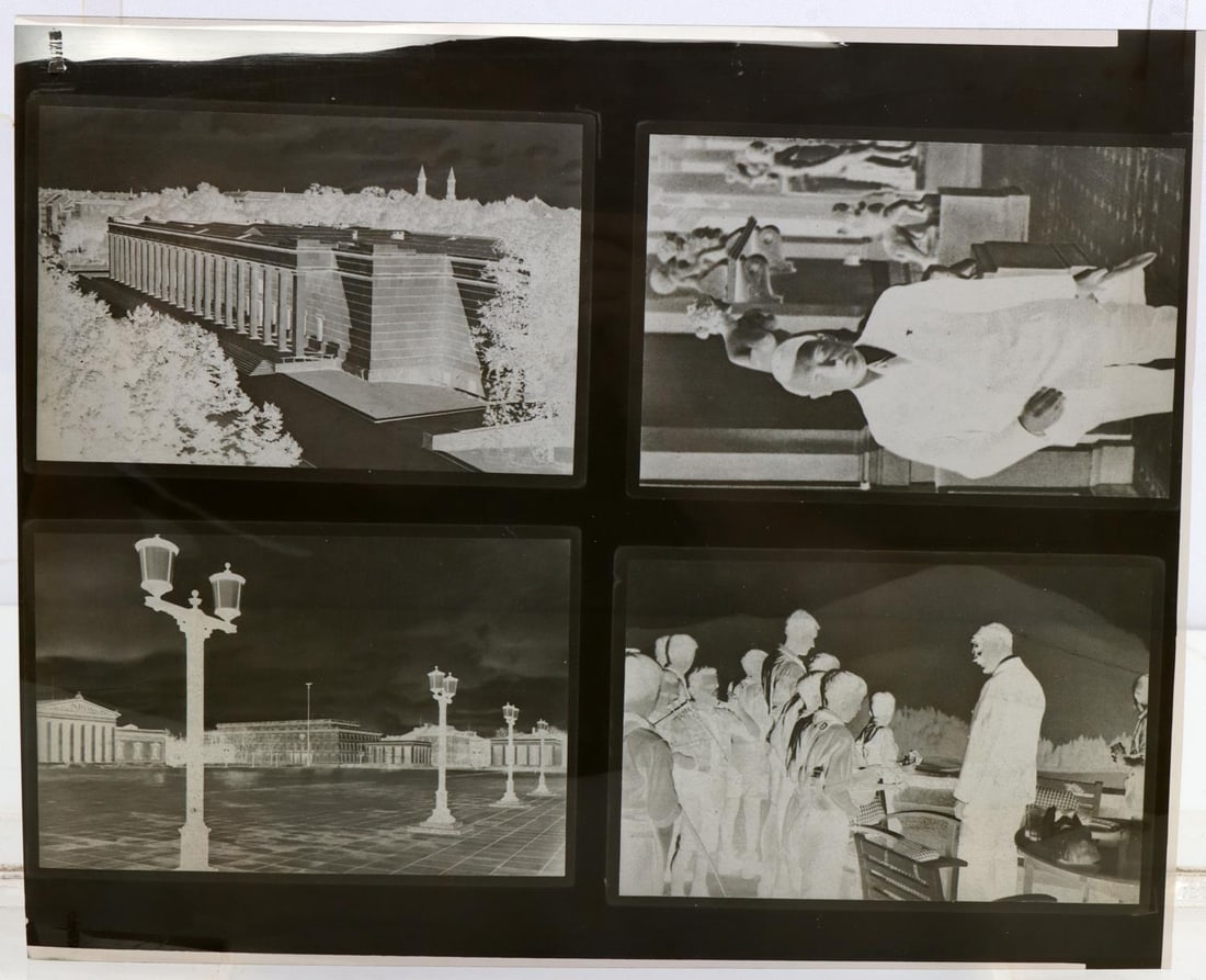 ADOLF HITLER HIENRICH HOFFMANN PHOTOGRAPH NEGATIVE: 4 different cellulose negatives of photographs taken by Heinrich Hoffman of architecture and Adolf Hitler. One solo photograph of Adolf Hitler at Eagle's Nest and and another at the same location outd