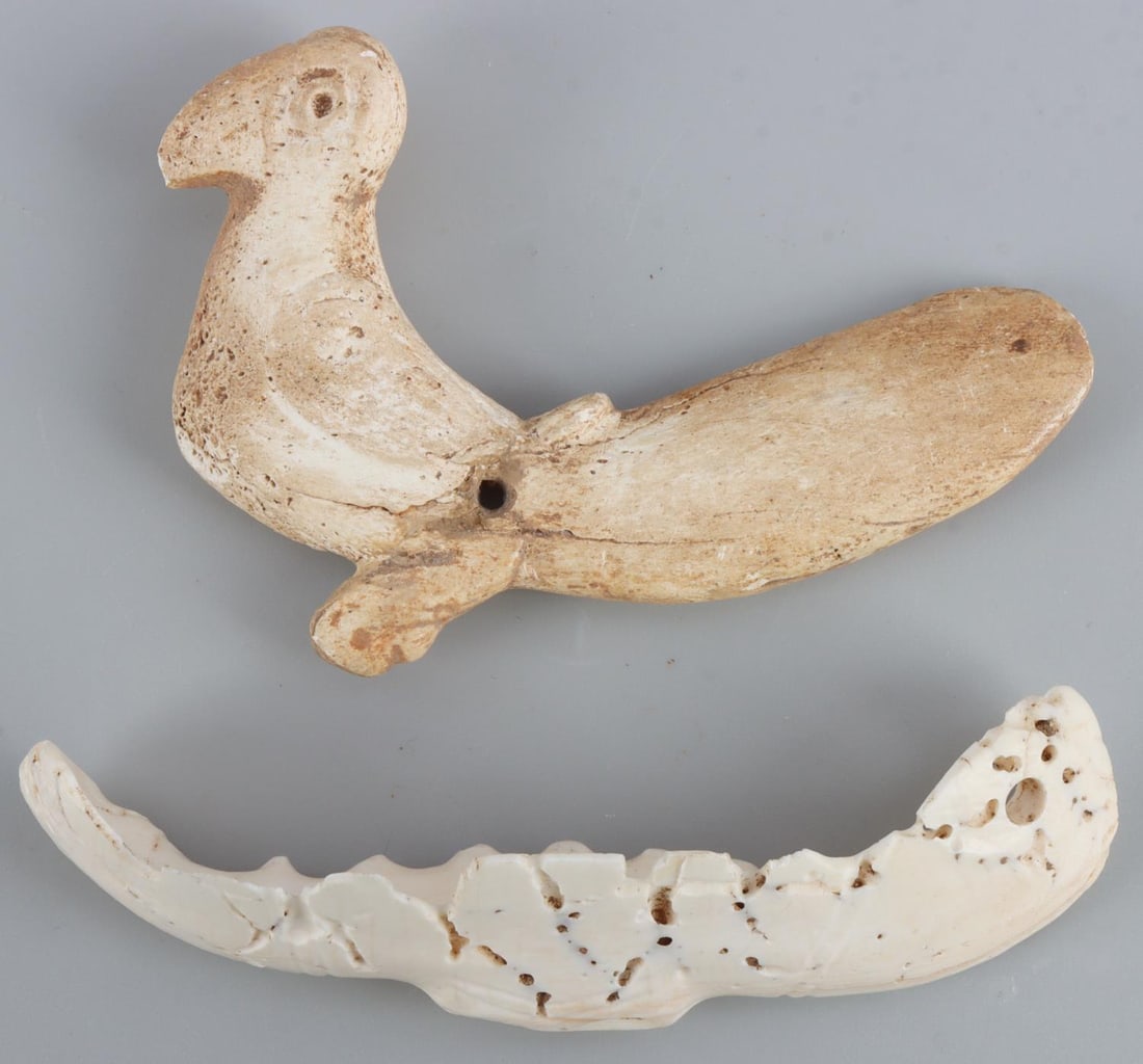 TAINO BIRD TONGUE SPATULA AND BAT LIKE CARVING: Taino. PreColumbian. Bird tongue spatula, used to depress the tongue at the back of the mouth to induce purging prior to taking the hallucinogen cohoba. Small chip on tip of tail. Made of manatee bone