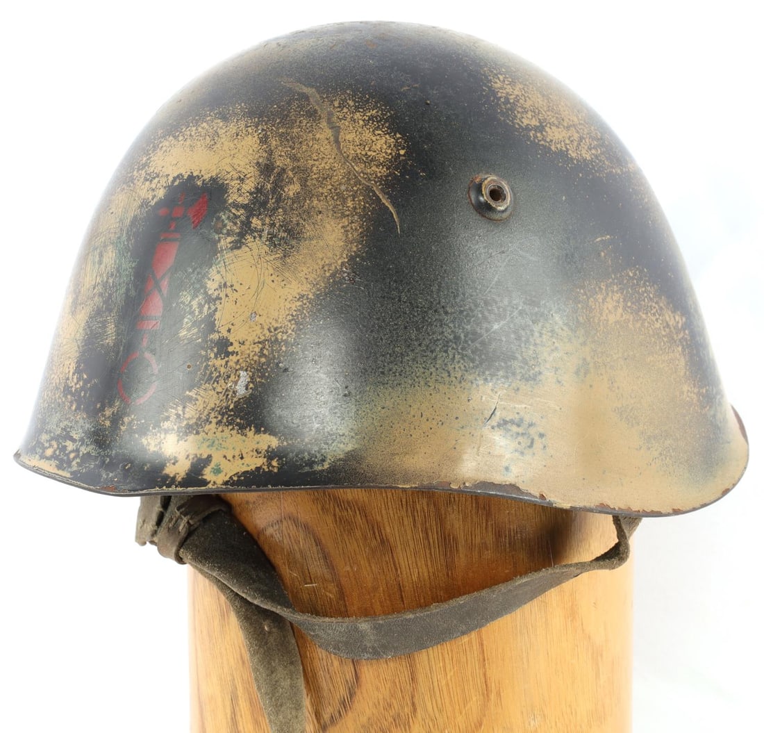 WWII ITALIAN FASCIST MVSN BLACKSHIRTS M1933 HELMET: Stalk over circle at front, with chinstrap and liner, some scratches and surface rust, overall good original condition.
