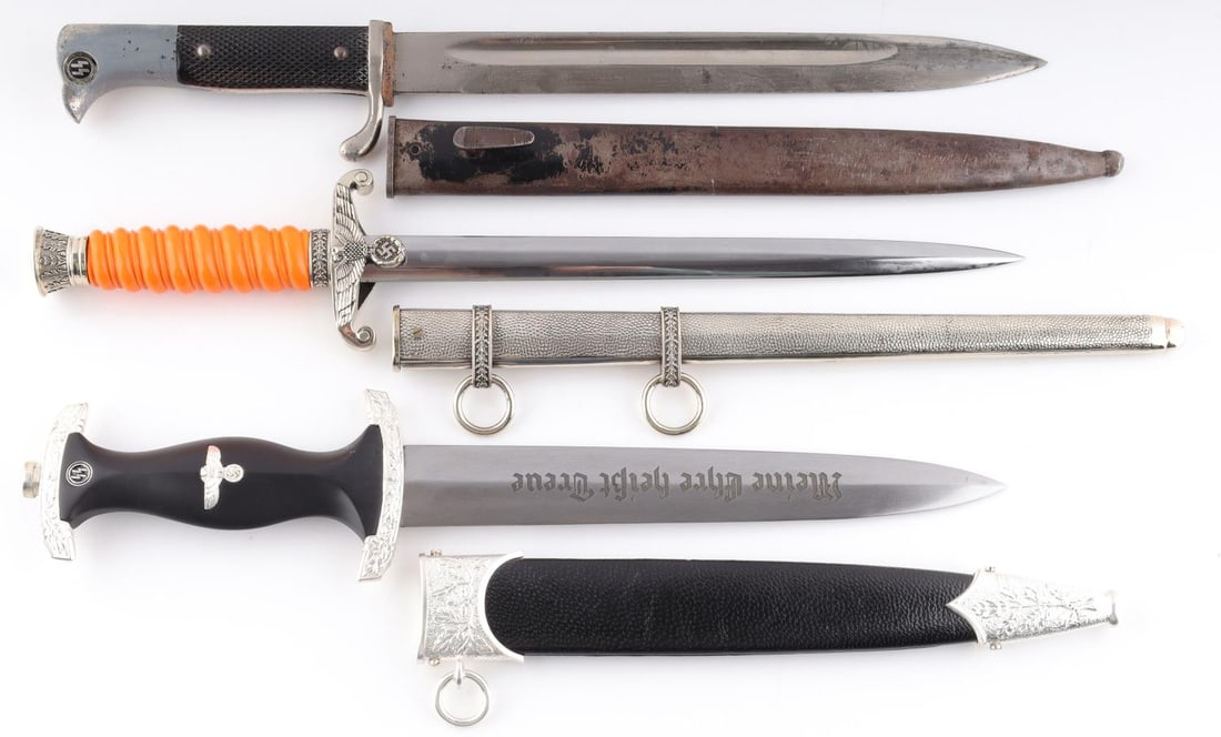 WWII GERMAN THIRD REICH DAGGERS AND BAYONET LOT: Lot of three (3) WWII German Third Reich edged weapons includes 2 daggers and 1 bayonet. WWII German bayonet by Eickhorn, Solingen. WWII German SS Honor dagger by Eickhorn Solingen. WWII German Army d