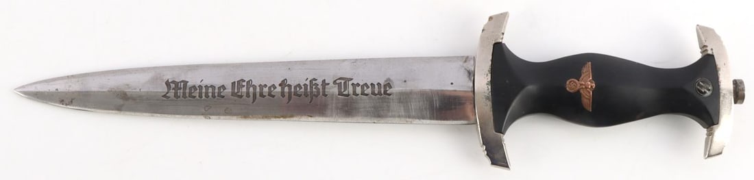 WWII GERMAN THIRD REICH SS HONOR DAGGER: SS motto etched into steel blade. Ebonized grip inlaid with Parteiadler and SS runes. Crossguards are nickel plated. It measures 13 1/2 inches. Reverse does not have a maker's mark. Unauthenticated, s