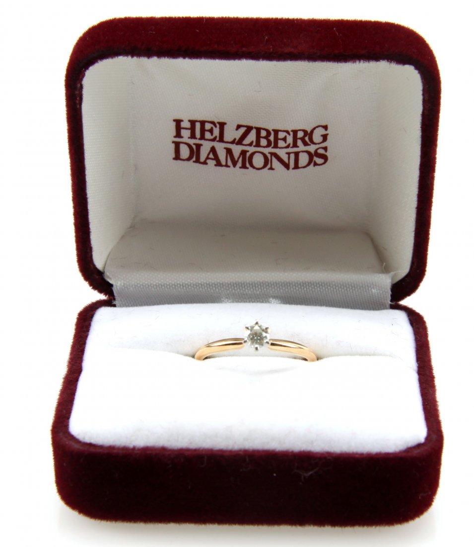 LADIES 14K YELLOW GOLD DIAMOND SOLITAIRE RING: Features one six prong set round cut approx. 0.25 cts. diamond. Approx. clarity I1, color K. Size: 8.25 Weight: 2.1 grams Condition: Overall in very good condition.