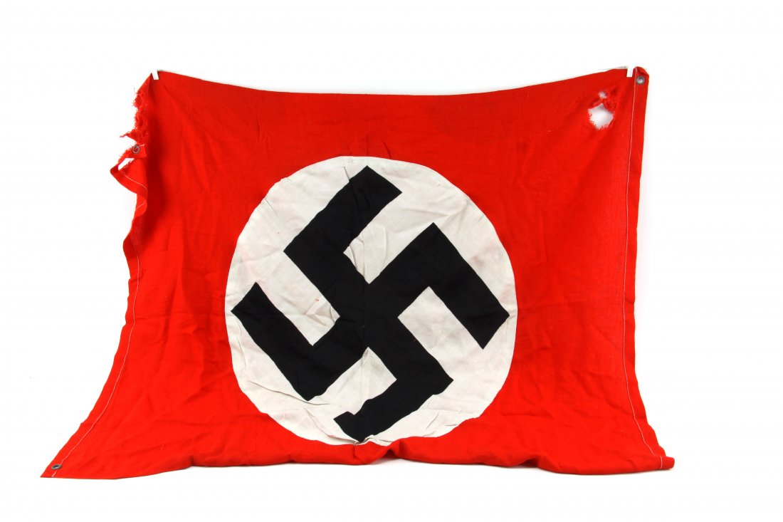WWII GERMAN NAZI PARTY BANNER WITH GROMMETS: WWII German Nazi party flag, measuring approximately 33 by 40 inches. Two holes in top corners.