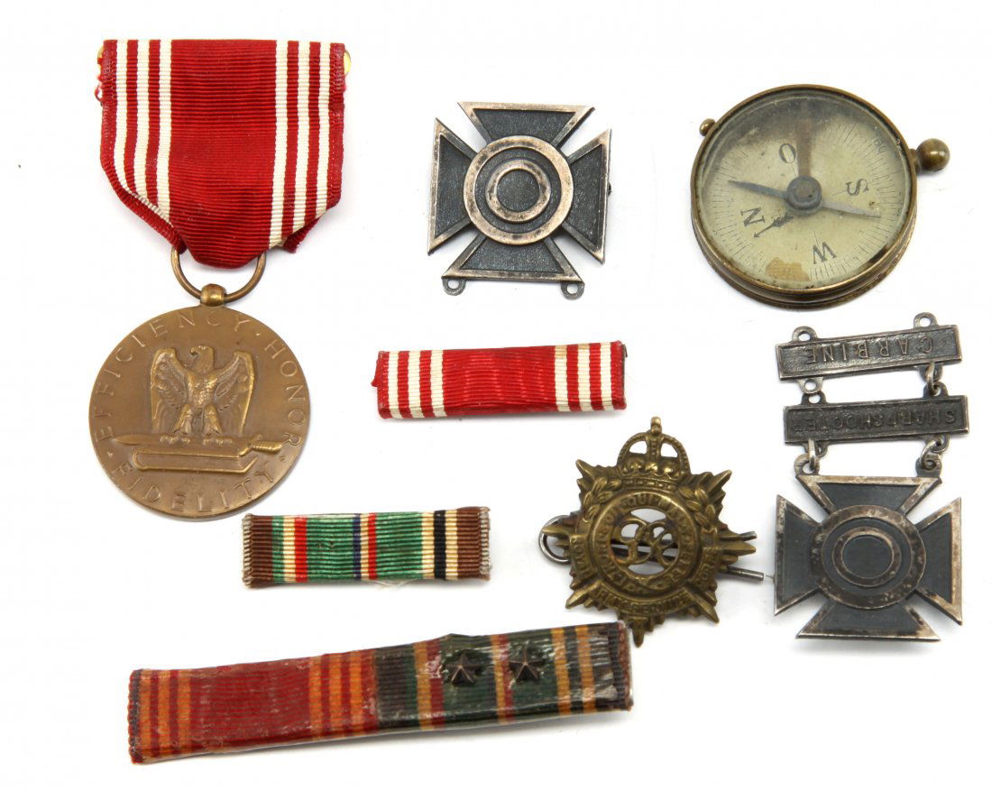 LOT OF WWII ERA US INSIGNIA & MILITARIA: Lot of WWII US items good conduct medal, ribbon bars, brass compass, two sharpshooter insignia in sterling (18.5 grams), small brass compass, and one Canadian Royal Army Service Corps pin.