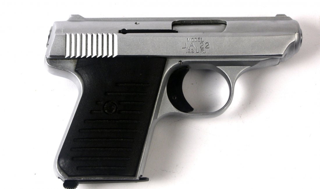 JIMINEZ ARMS JA22 SEMI AUTO PISTOL WITH BOX: Jiminez Arms Model JA 22 pistol, with original box and extra magazine, lock, and literature. Excellent condition. Caliber: .22 LR Serial #: 1141280