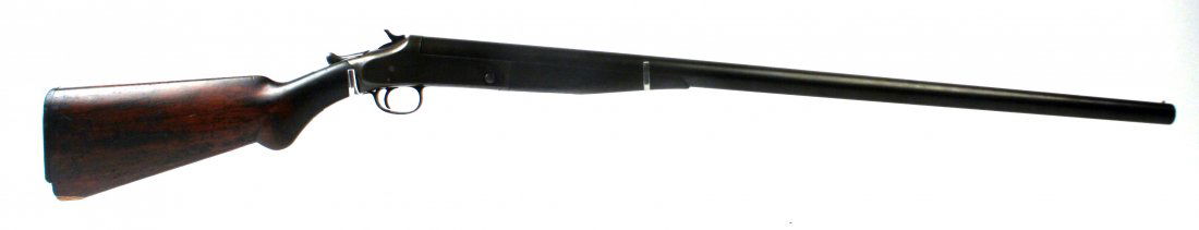 HARRINGTON & RICHARDSON SINGLE SHOT 12 GAUGE: Vintage H&R single shot 12 gauge shotgun. Finish mostly gone, replaced by a plum patina. Bore is good, and stock has chip in butt and butt plate, and hairline fracture near wrist. Overall fair conditi