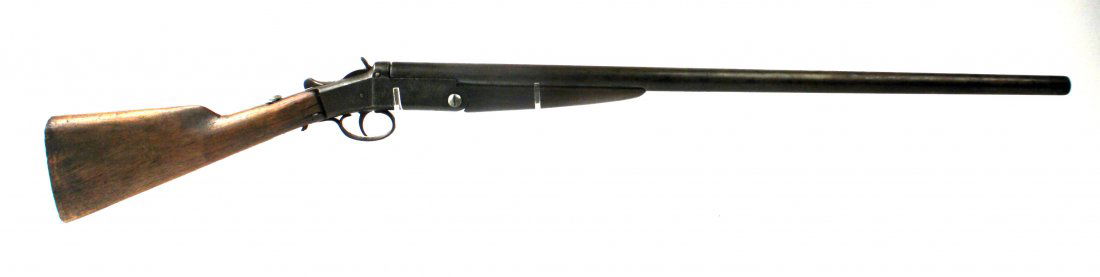 UNMARKED SINGLE SHOT 12 GAUGE: Single shot 12 gauge shotgun, with markings worn away. Stock is loose, gun is missing screws. Poor condition, unsafe to fire. Wall hanger or parts value. Caliber: 12 Gauge Serial #: 708