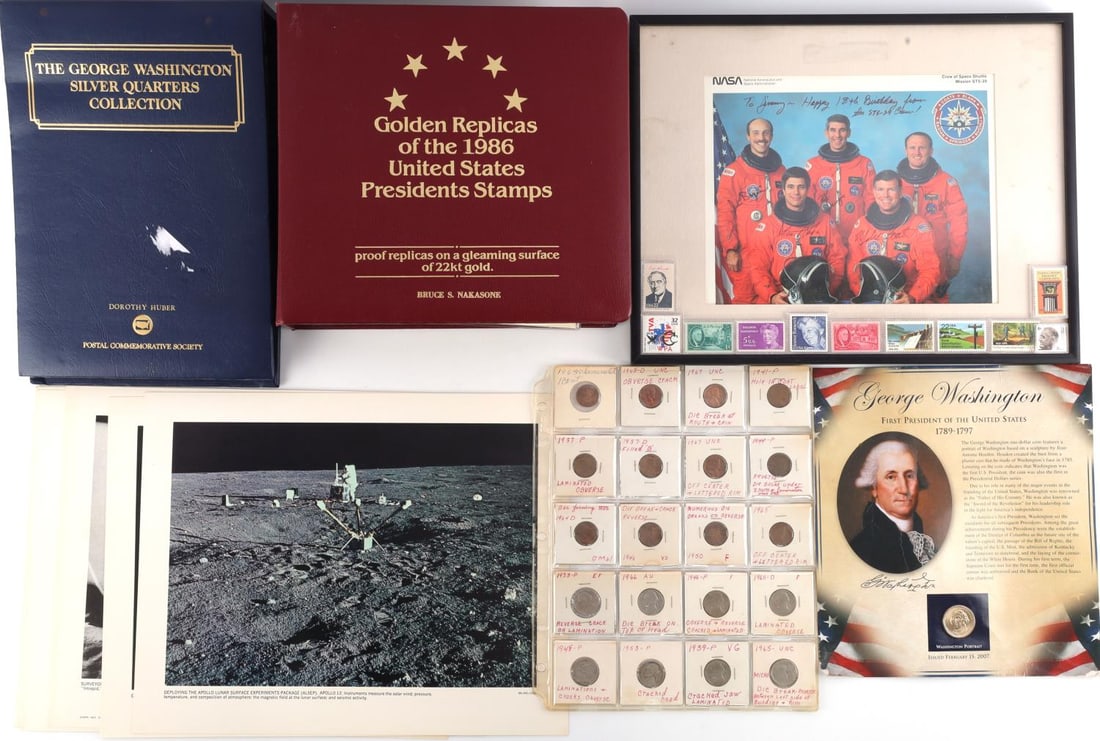 SILVER COINS STAMPS SHUTTLE CREW SIGNED PHOTO: Lot includes a page of minor error coins, Washington dollar, $2.00 face value of 90% silver Washington Quarters inn a display binder, 10 Mint non Hinged stamps from 1930's to 1980's, binder of 1986 Go