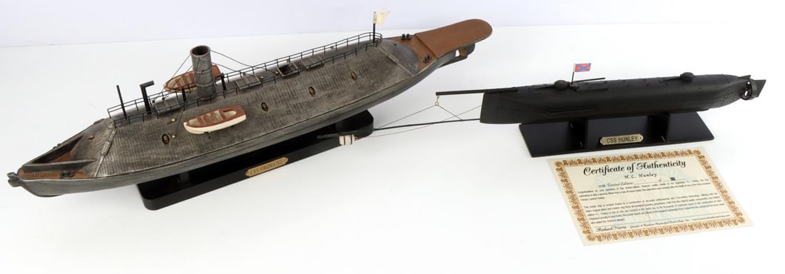 CIVIL WAR CSS VIRGINIA BOAT AND CSS HUNLEY MODELS: Ironsides Boat Model of the C.S.S. Virginia. Dimension: 24 X 7 X 4.5 inches. Civil War replica of the famous CSS Hunley model with COA #84 of 100. Dimension: 24" L x 2" W x 8" H (1:30 scale) inches. B