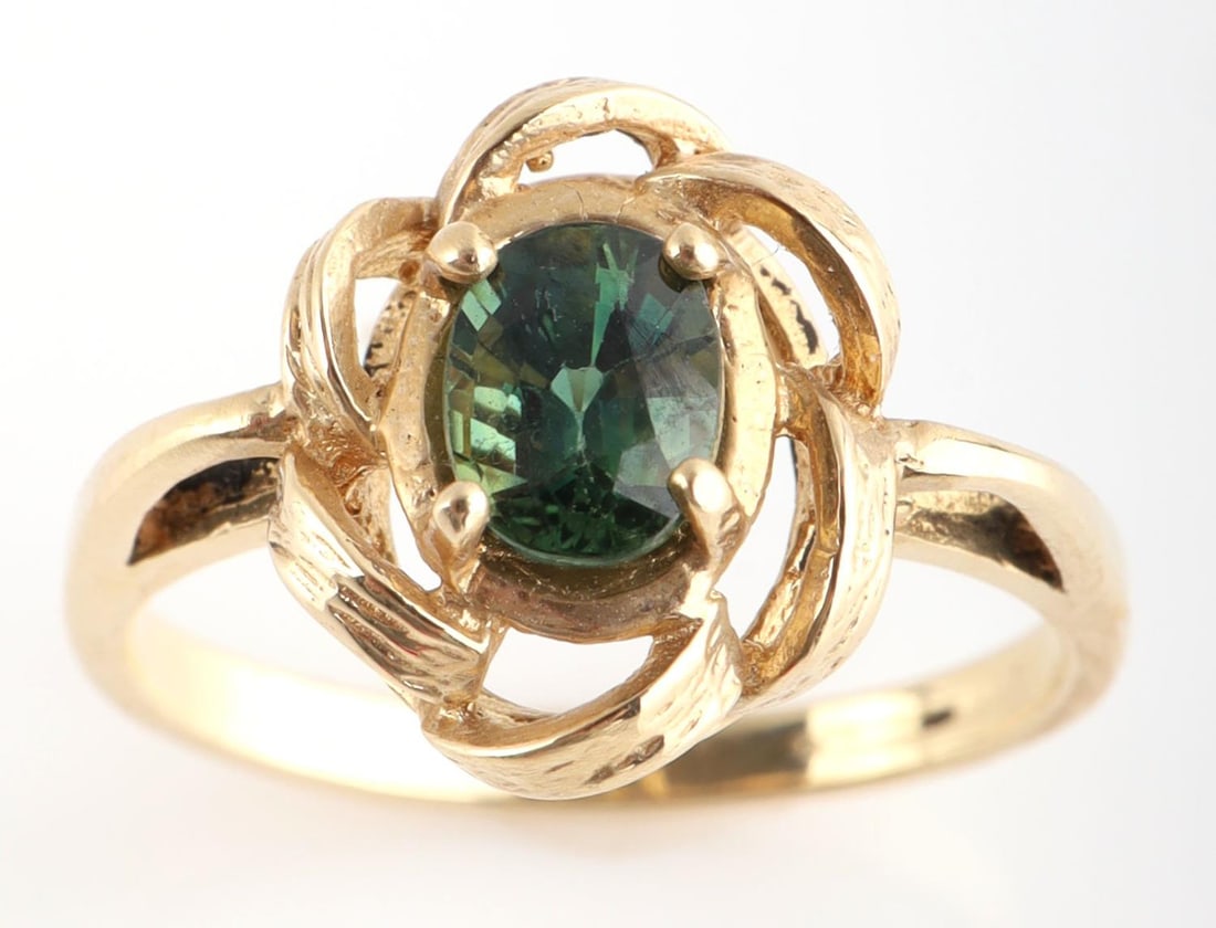 GREEN CHRYSOBERYL .45CT 14K YELLOW GOLD RING: Green Chrysoberyl .45 carats, 14k yellow gold ring, weight 2.7 grams, size 6. 14k stamp on the inside of shank.