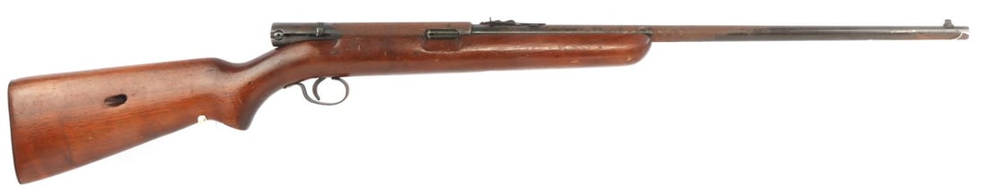 WINCHESTER MODEL 74 .22 LR CALIBER RIFLE: A Vintage Winchester, Model 74, .22LR caliber, single shot rifle. Barrel is marked, "Made in New Haven, Conn." and "Winchester Trade Mark". Serial #146622. Barrel has heavy pitting and oxidation. Wood