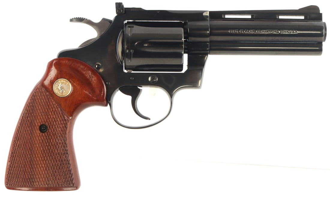 COLT SNAKE SERIES DIAMONDBACK 22 LR REVOLVER: Blued finish. Wooden grips. Manufactured in 1978. Barrel measures 3 7/8 inches. Bore is bright and clear. Very good condition overall. FFL required for transfer. No international shipping. Know your s
