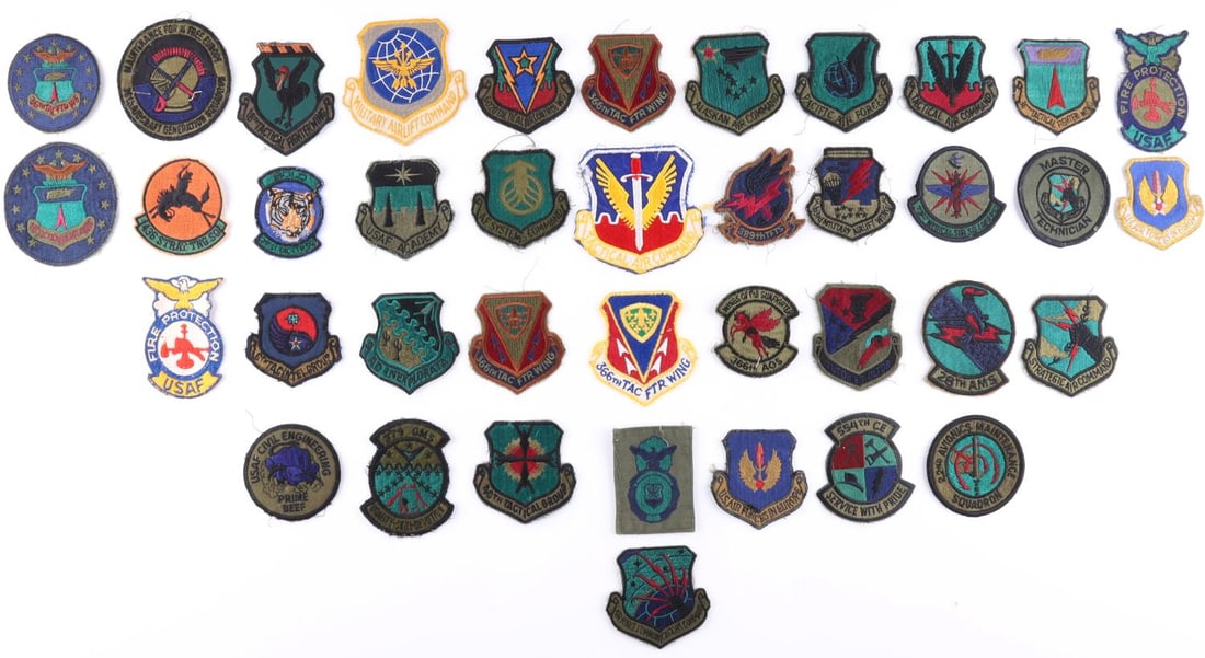 40 WWII US AIR FORCE FIGHTER SQUADRON PATCHES LOT: Lot of forty (40) various WWII United States Military Air Force fighter squadron patches including the 366th Fighter Wing, the 18th Tactical Fighter Wing, 28th Avionics Maintenance Squadron, Systems C