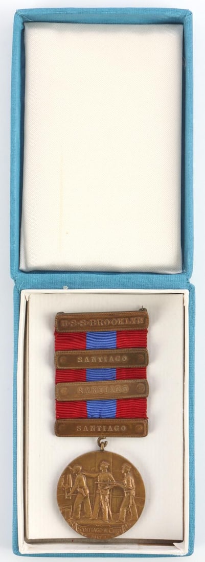SPAN-AM WAR NAVY WILLIAM SAMPSON NAMED MEDAL: Named medal for Seaman Peter Lee aboard the USS Brooklyn. With three devices for the battle of Santiago : June 6. June 10. and June 2. Suspension ring missing a small section. In good overall conditio