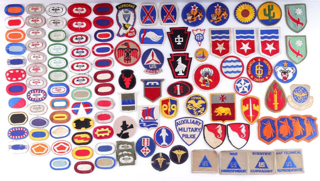 WWII US LARGE LOT OF PATCHES PIR INSIGNIA & MORE: Includes Airborne, Air force, Army and more. A few fluoresce but most do not.