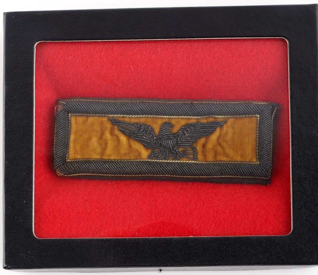 INDIAN WAR COLONEL OF CAVALRY SHOULDER STRAP: 1 framed Indian War Colonel's Cavalry shoulder strap. Dimension: 3.75 X 1.3 inches and in very good condition. .