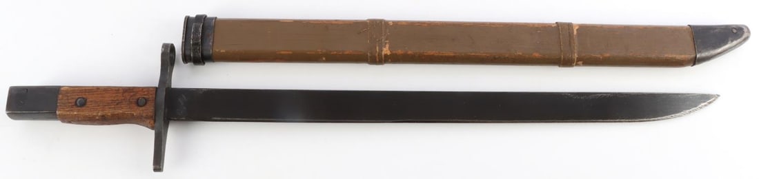 WWII JAPANESE TYPE 30 BAYONET W WOODEN SCABBARD: Maker marked at ricasso. Matsushita Kinzoku late WWII bayonet. Blade measures 15 5/8 inches, 21 7/8 inches with wooden scabbard. Scabbard has metal chape. Nice overall condition with good edge on blad