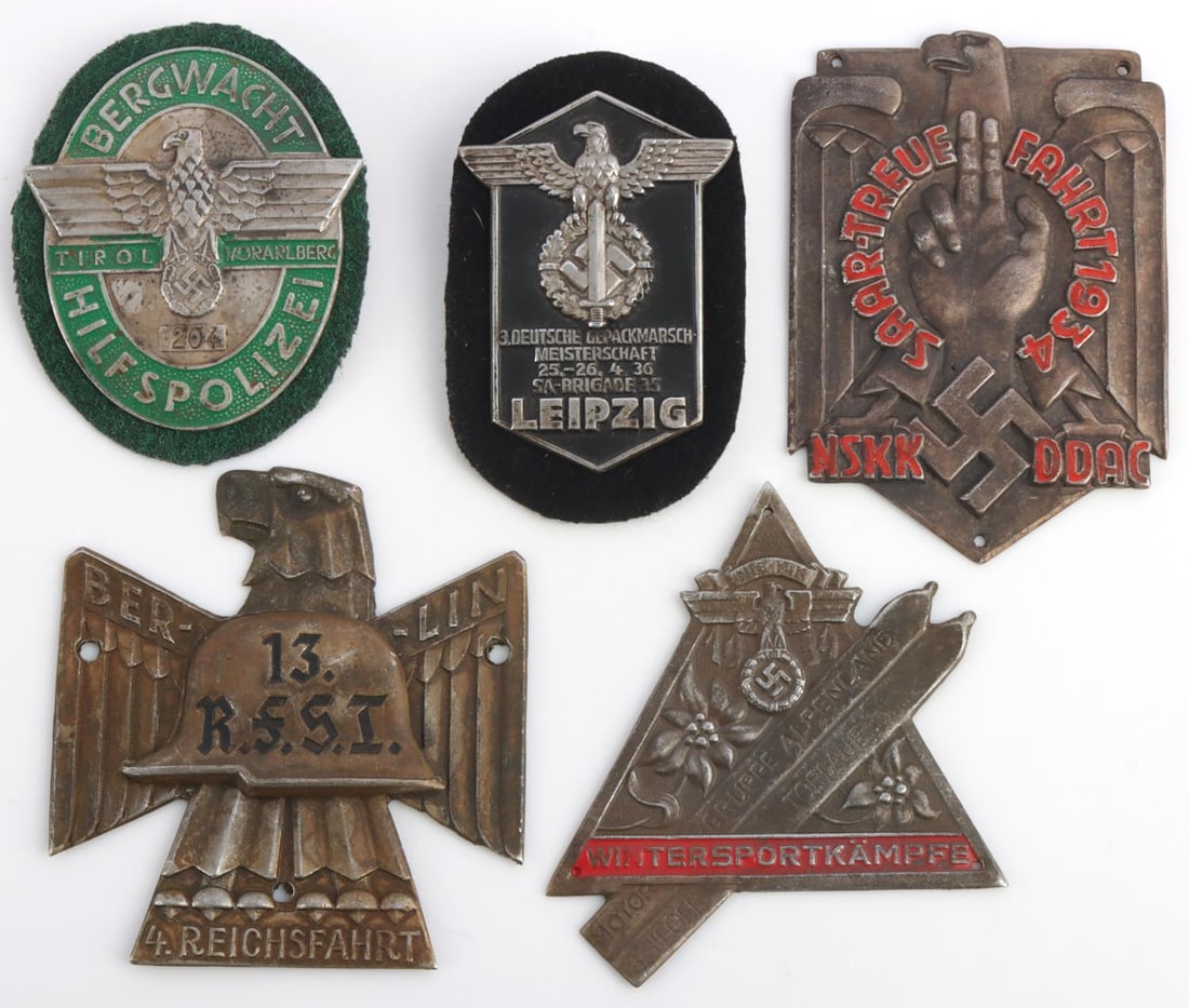 WWII GERMAN THIRD REICH PLAQUE AND SHIELD LOT OF 5: WWII German Third Reich lot of 5 shields and plaques. 1934 NSKK/DDACRally, NSKK motor group "Alpenland", 1936 March of SA Brigade, Tirol Mountain Police, 4th Berlin Reich ride. All in very good condit
