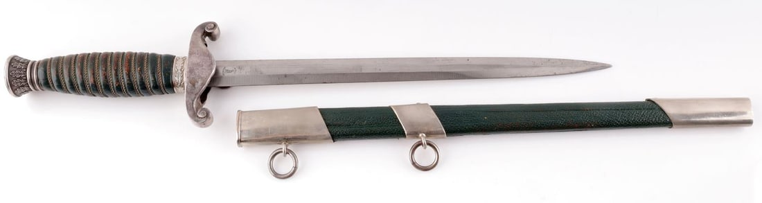 WWII GERMAN REICH LAND CUSTOMS DAGGER W SCABBARD: WWII German Reich land customs dagger with scabbard. Ricasso of the blade is marked, "A.W. Jr. Solingen." Blade length approx. 10 inches, full dagger with scabbard approx. 16 1/2 inches. Good conditio