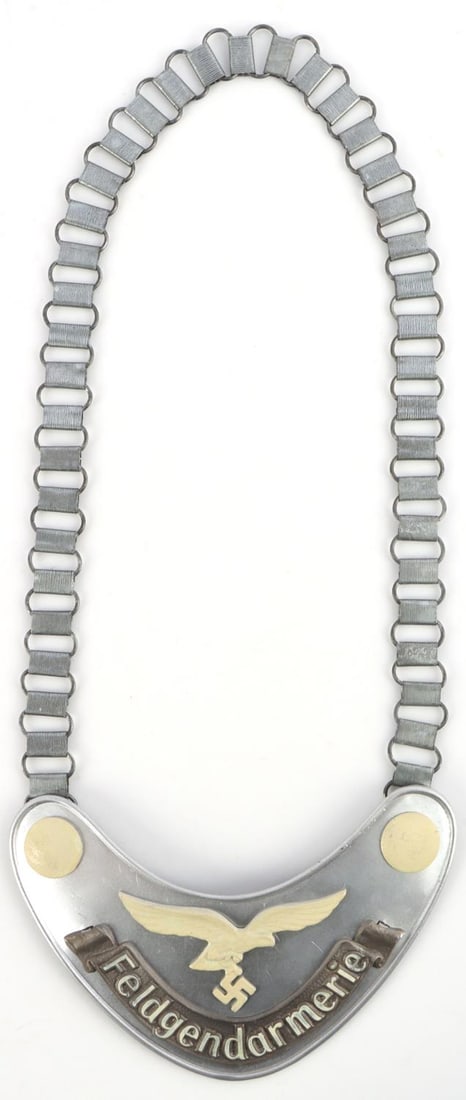 WWII GERMAN REICH LUFTWAFFE FIELD ZHANDARM GORGET: WWII German Reich Luftwaffe Field Zhandarm gorget with chain. Marked 1935 along with Luftwaffe eagle on the backside. Chain length approx. 25 inches. Good condition. Unauthenticated, sold as is. This