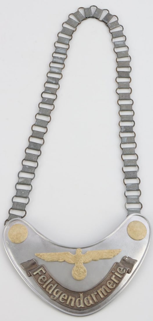 WWII GERMAN REICH ARMY FIELD ZHANDARM GORGET CHAIN: WWII German Reich army Field Zhandarm gorget with chain, "Feldgendarmerie." Makers mark "DRGM." Gorget size approx. 6 inches, chain approx. 25 inches. Unauthenticated, sold as is. This lot has a reser